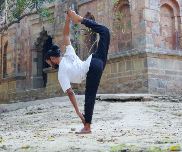 Woman practising yoga online Australia